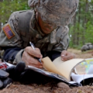A cadet maps out a plan of attack during a training session at LDAC.