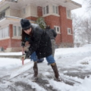 Kids shovel snow after Pocatello sees its first big snow of the season.